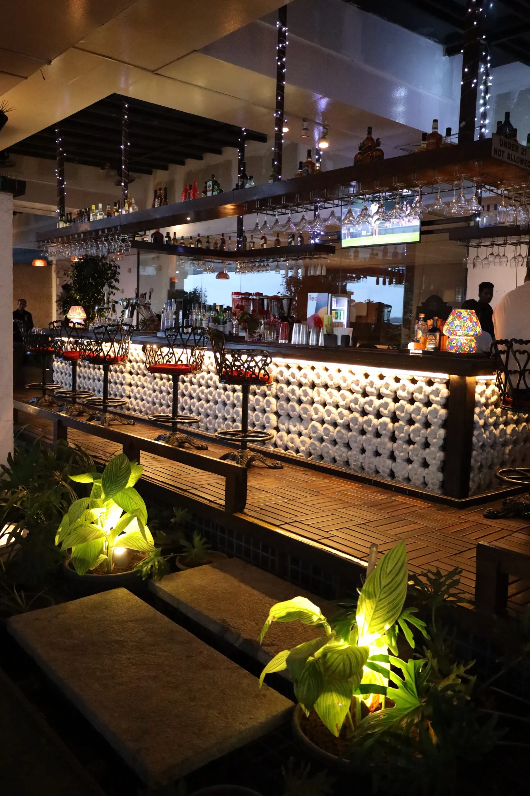 Exotica rooftop bar and dining area lit up at night, Yerwada, Pune